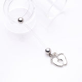 Detail View 2 of Baby Feet Sparkle Dangle Bio-Flex Pregnancy Belly Button Ring-Clear Gem