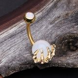 Detail View 2 of Golden Moonstone Orb Shine Skeleton Hand Belly Button Ring