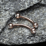 Detail View 1 of Rose Gold Gem Ball Curved Barbell Eyebrow Ring-Clear Gem