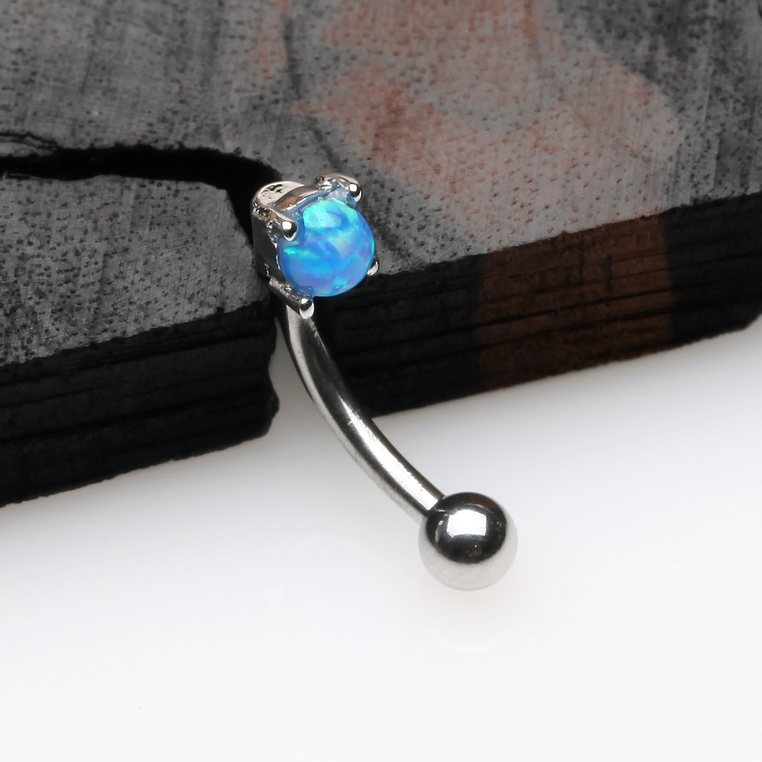 Detail View 1 of Fire Opal Prong Set Sparkle Curved Barbell-Blue Opal