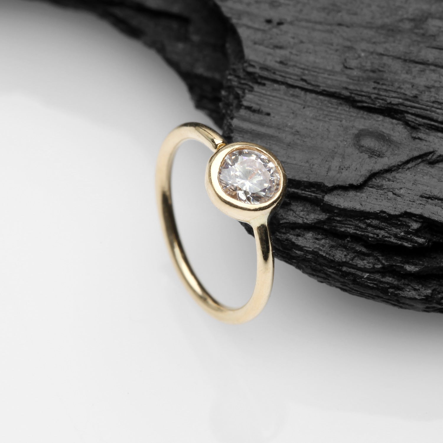 Detail View 1 of 14 Karat Gold Bezel Set Sparkle Gem Bendable Hoop Ring