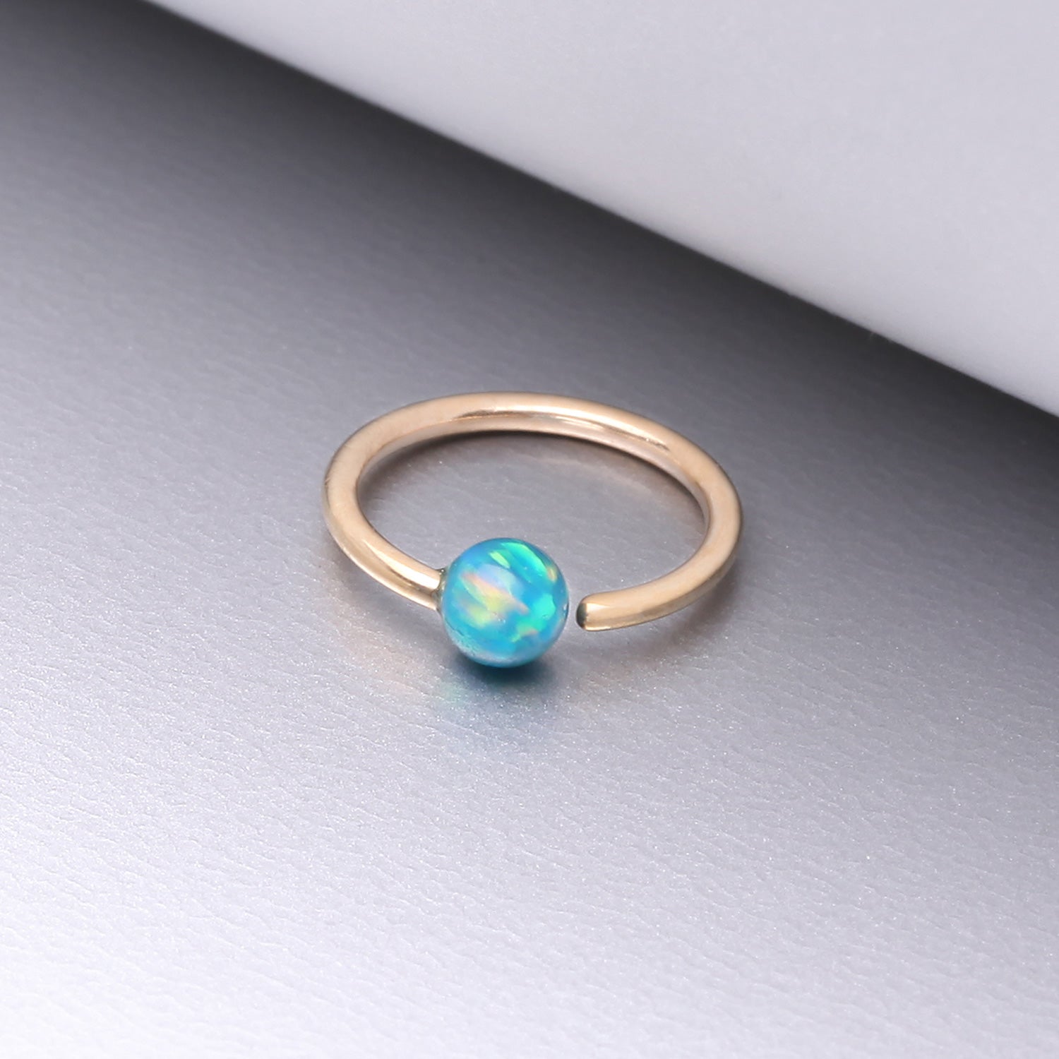 Detail View 1 of 14 Karat Gold Fire Opal Ball CBR Style Bendable Hoop Ring-Green Opal