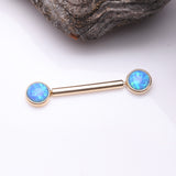Detail View 1 of A Pair of 14 Karat Gold OneFit Threadless Round Fire Opal Bezel Set Nipple Barbell-Blue Opal
