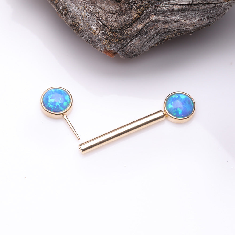 Detail View 2 of A Pair of 14 Karat Gold OneFit Threadless Round Fire Opal Bezel Set Nipple Barbell-Blue Opal