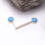 Detail View 2 of A Pair of 14 Karat Gold OneFit Threadless Round Fire Opal Bezel Set Nipple Barbell-Blue Opal