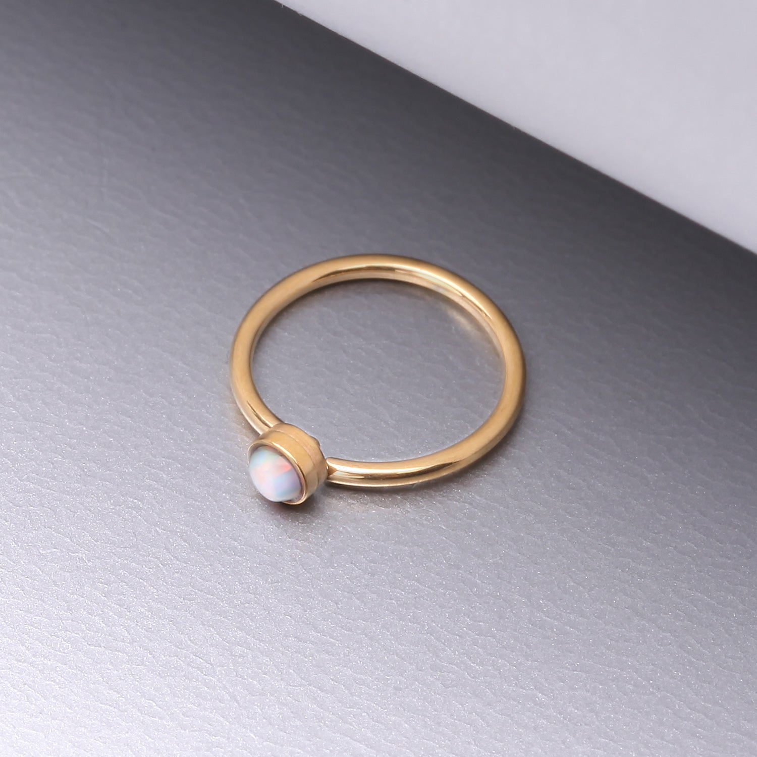Detail View 1 of Golden Fire Opal Sparkle Bezel Set Bendable Hoop Ring-White Opal
