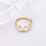 Detail View 1 of Golden Adorable Leaflet Wreath Steel Clicker Hoop Ring