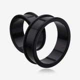 A Pair of Flexible Silicone Double Flared Ear Gauge Tunnel Plug