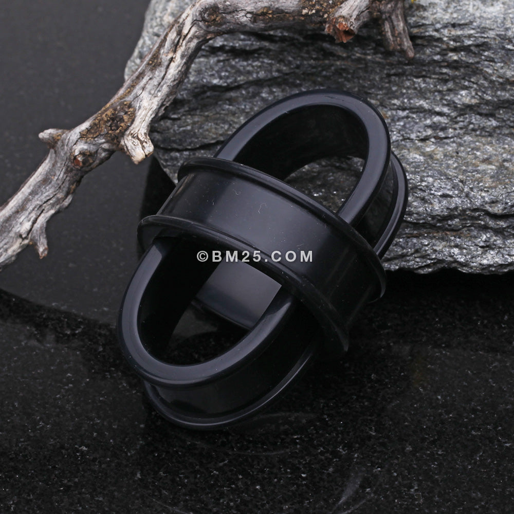 A Pair of Flexible Silicone Double Flared Ear Gauge Tunnel Plug