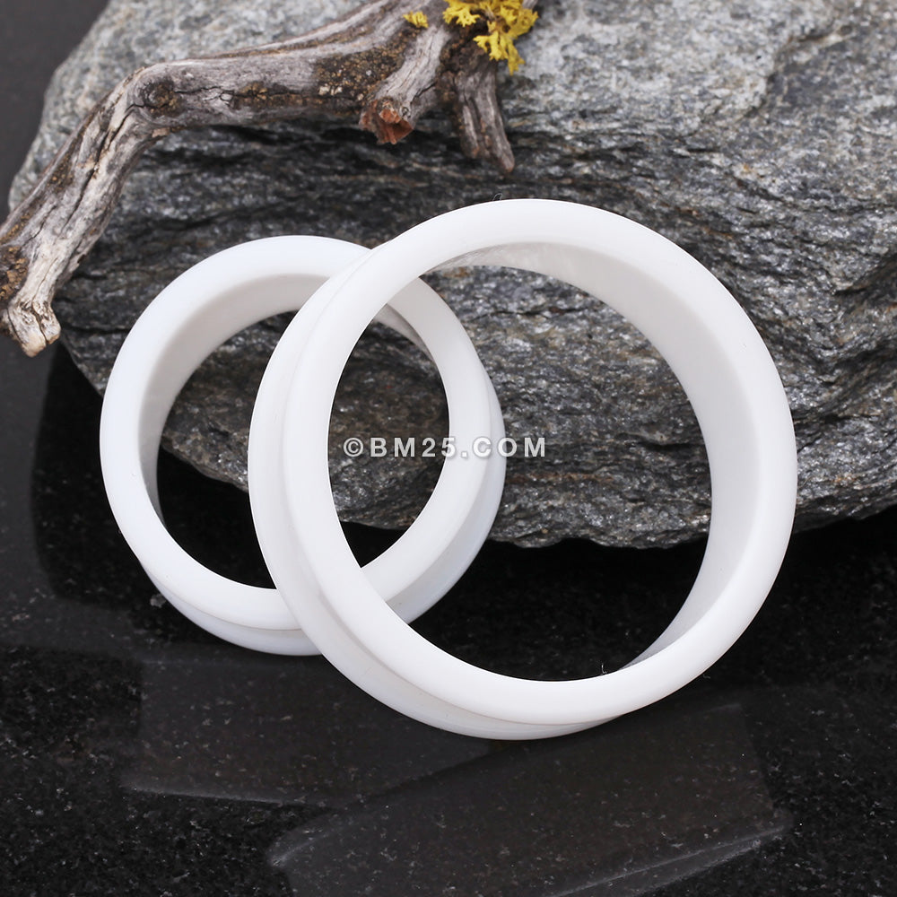 A Pair of Flexible Silicone Double Flared Ear Gauge Tunnel Plug