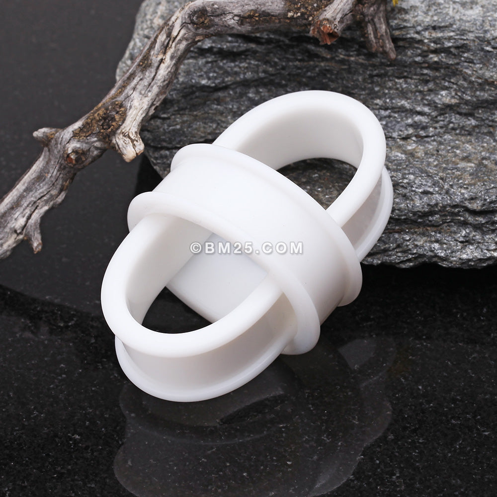 A Pair of Flexible Silicone Double Flared Ear Gauge Tunnel Plug