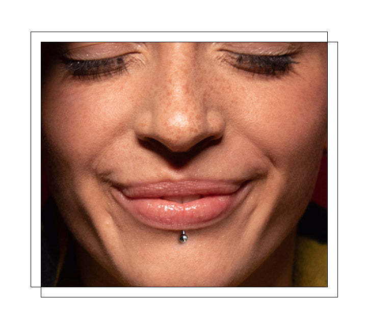 Located on the right on, or around, the lip area. It can also be in the center, as well as the right or left side of the bottom lip. Lip piercing is always such a popular choice thanks to the sheer amount of style options available and ways to customize it. A labret piercing is traditionally a single perforation in the center just below the bottom lip, but not attached to the lip itself.