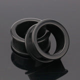 A Pair of Flexible Silicone Double Flared Ear Gauge Tunnel Plug