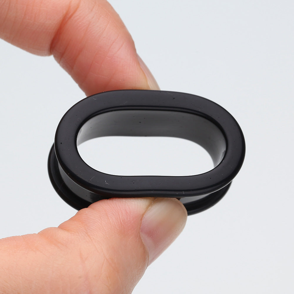 A Pair of Flexible Silicone Double Flared Ear Gauge Tunnel Plug