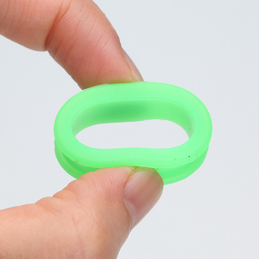 Detail View 2 of A Pair of Flexible Silicone Double Flared Ear Gauge Tunnel Plug-Green