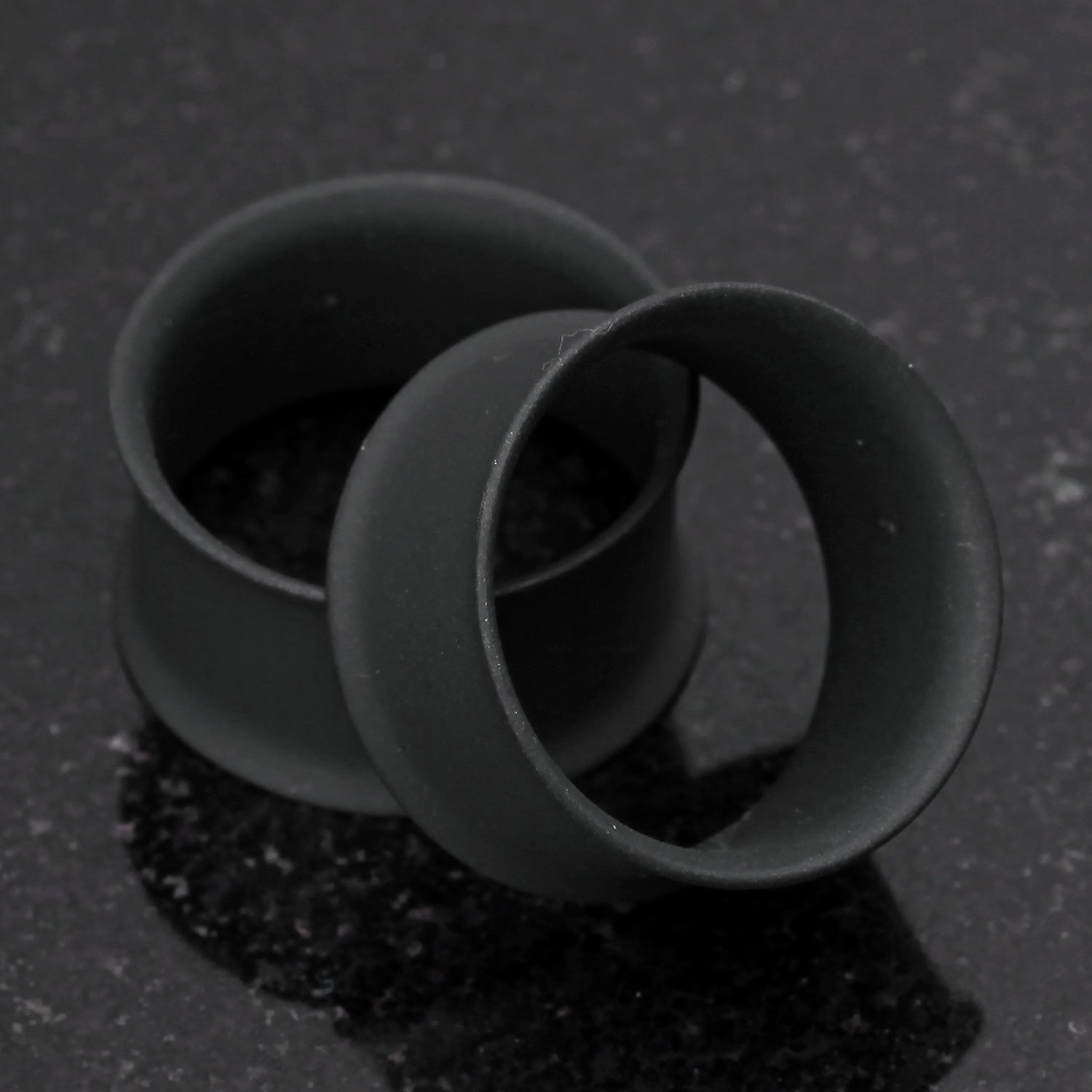 Detail View 1 of A Pair of Matte Black Steel Double Flared Ear Gauge Tunnel Plug-Black