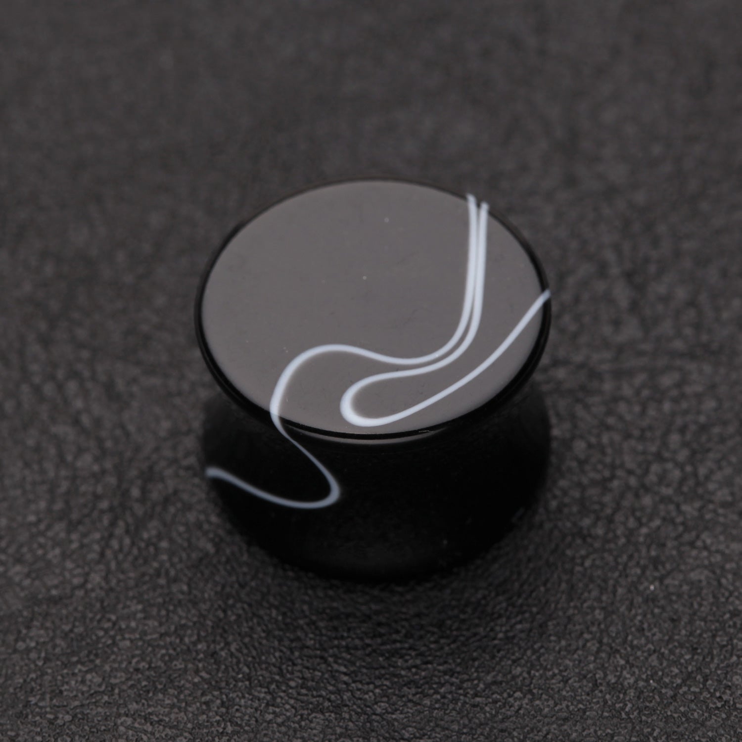 Detail View 1 of A Pair of Marble Swirl Acrylic Double Flared Ear Gauge Plug-Black