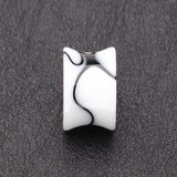 Detail View 2 of A Pair of Marble Swirl Acrylic Double Flared Ear Gauge Plug-White
