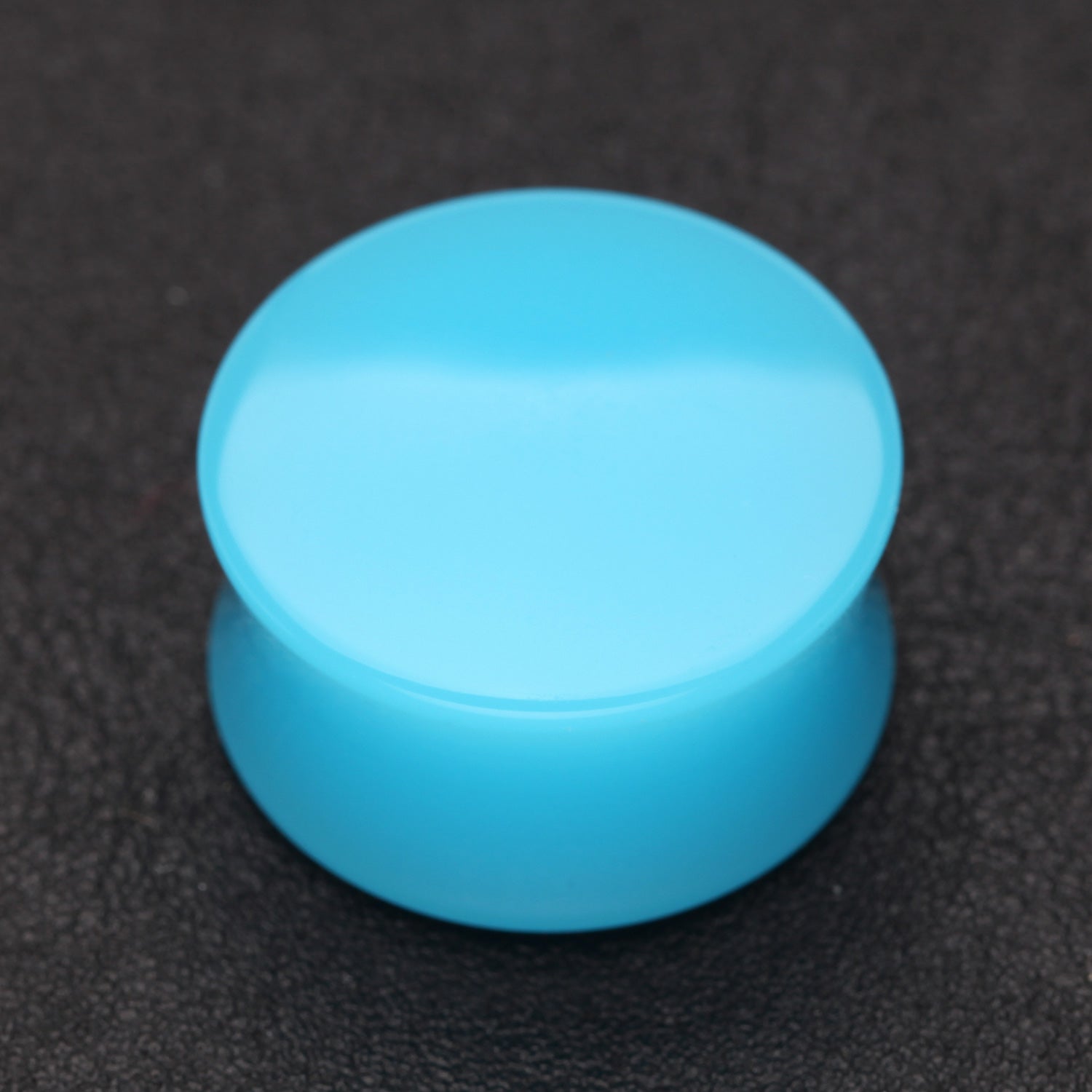 Detail View 1 of A Pair of Neon Colored UV Acrylic Double Flared Ear Gauge Plug-Light Blue