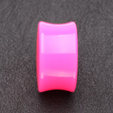 Detail View 2 of A Pair of Neon Colored UV Acrylic Double Flared Ear Gauge Plug-Pink