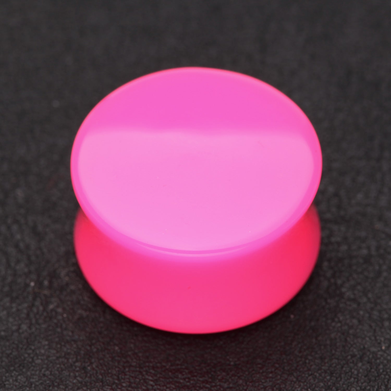 Detail View 1 of A Pair of Neon Colored UV Acrylic Double Flared Ear Gauge Plug-Pink
