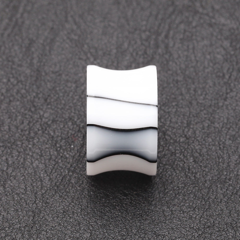 Detail View 2 of A Pair of Marble Swirl Acrylic Double Flared Ear Gauge Tunnel Plug-White