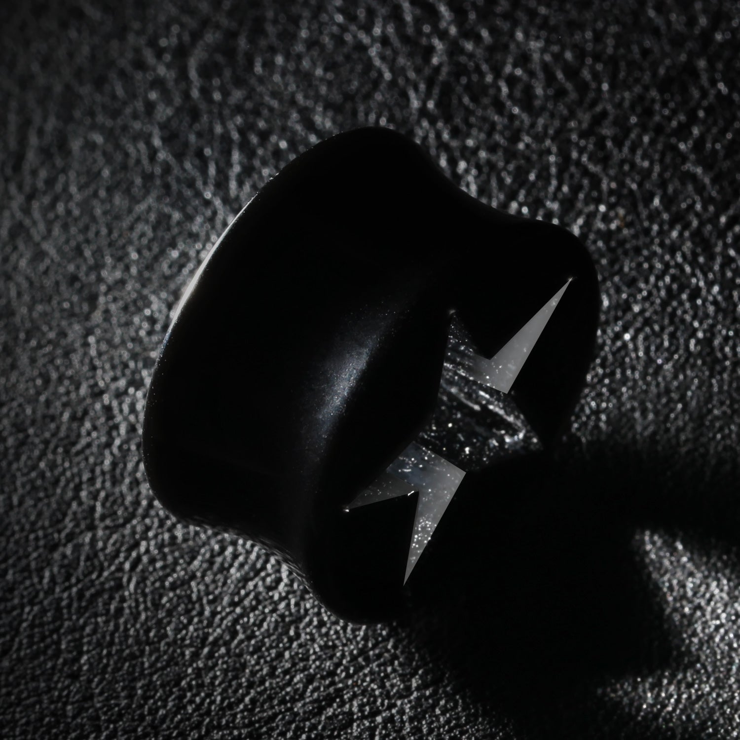 Detail View 1 of A Pair of Hollow Star Double Flared Ear Gauge Plug-Black