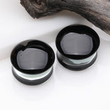 Detail View 1 of A Pair of Convex Black Front Glass Double Flared Ear Gauge Plug