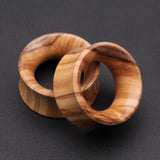 Detail View 1 of A Pair of Olive Wood Organic Double Flared Tunnel Plug-Orange/Brown