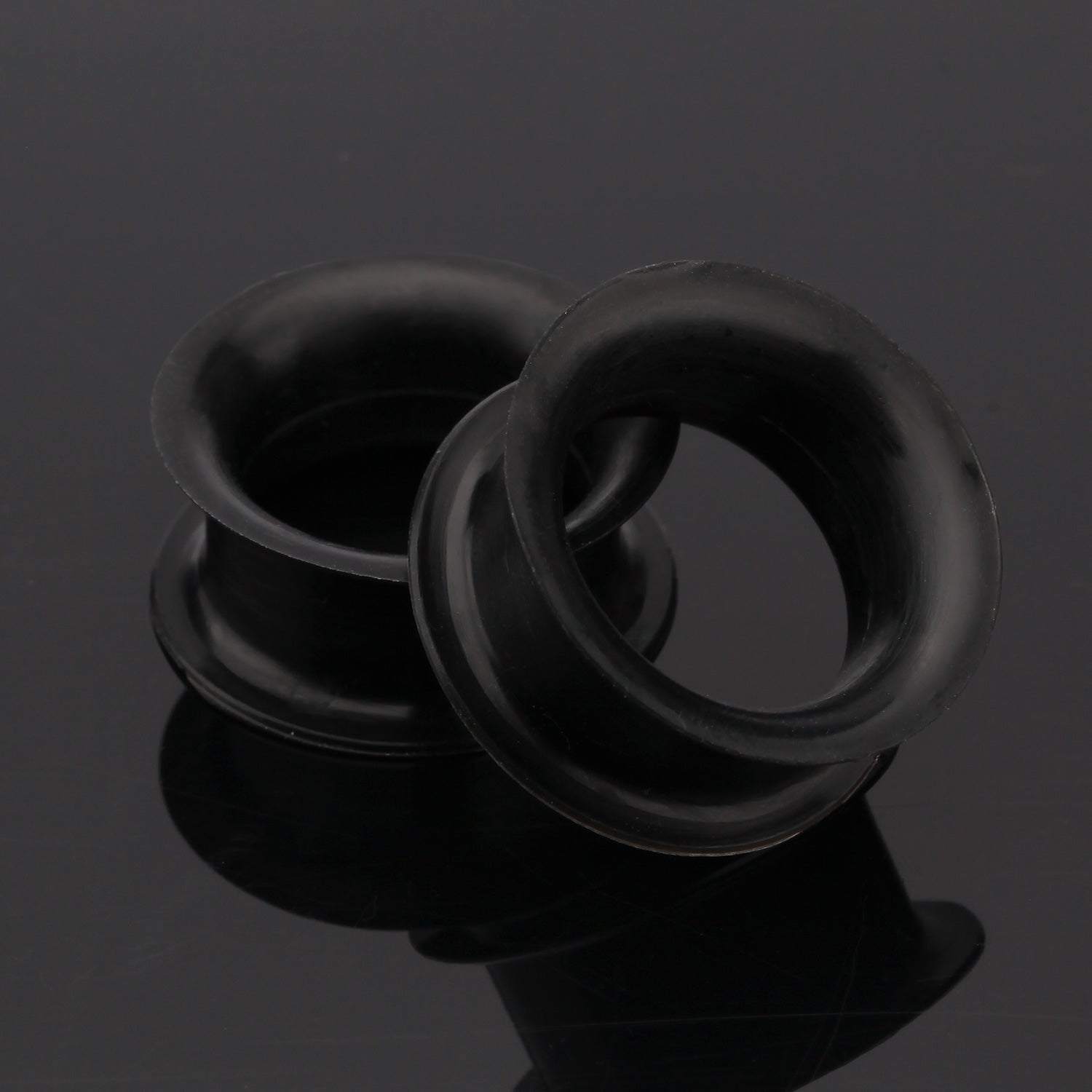 Detail View 1 of A Pair of Ultra Thin Flexible Silicone Ear Skin Double Flared Tunnel Plug-Black