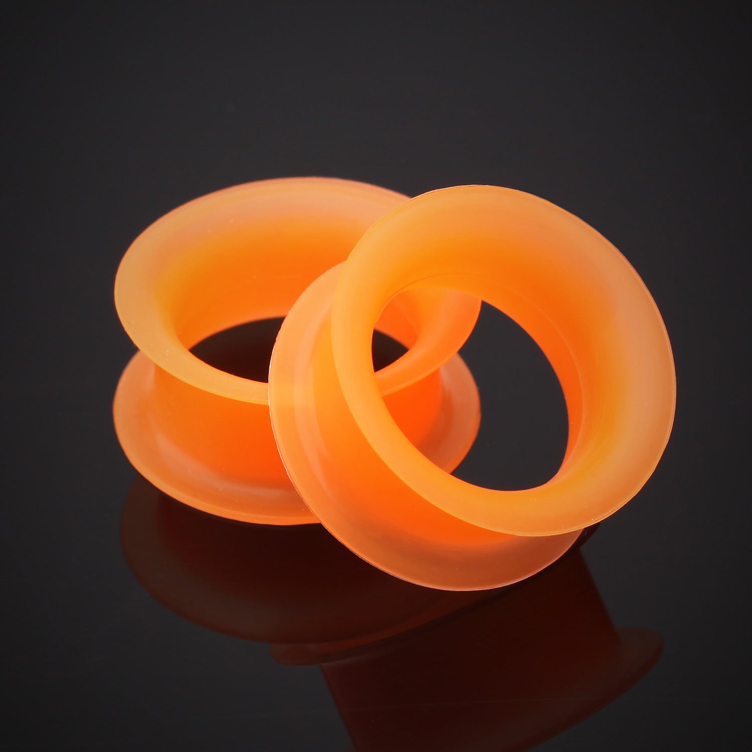 Detail View 1 of A Pair of Ultra Thin Flexible Silicone Ear Skin Double Flared Tunnel Plug-Orange