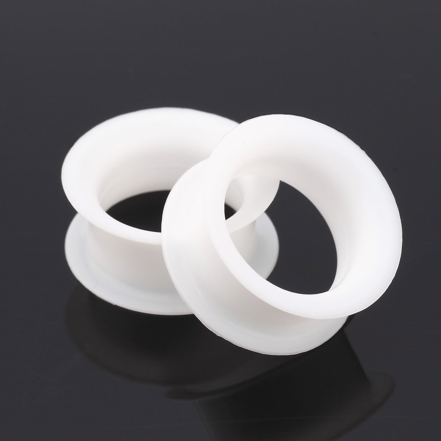Detail View 1 of A Pair of Ultra Thin Flexible Silicone Ear Skin Double Flared Tunnel Plug-White