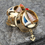 Detail View 2 of A Pair of Golden Sail Boat Anchor Dangle Ear Gauge Plug-Gold