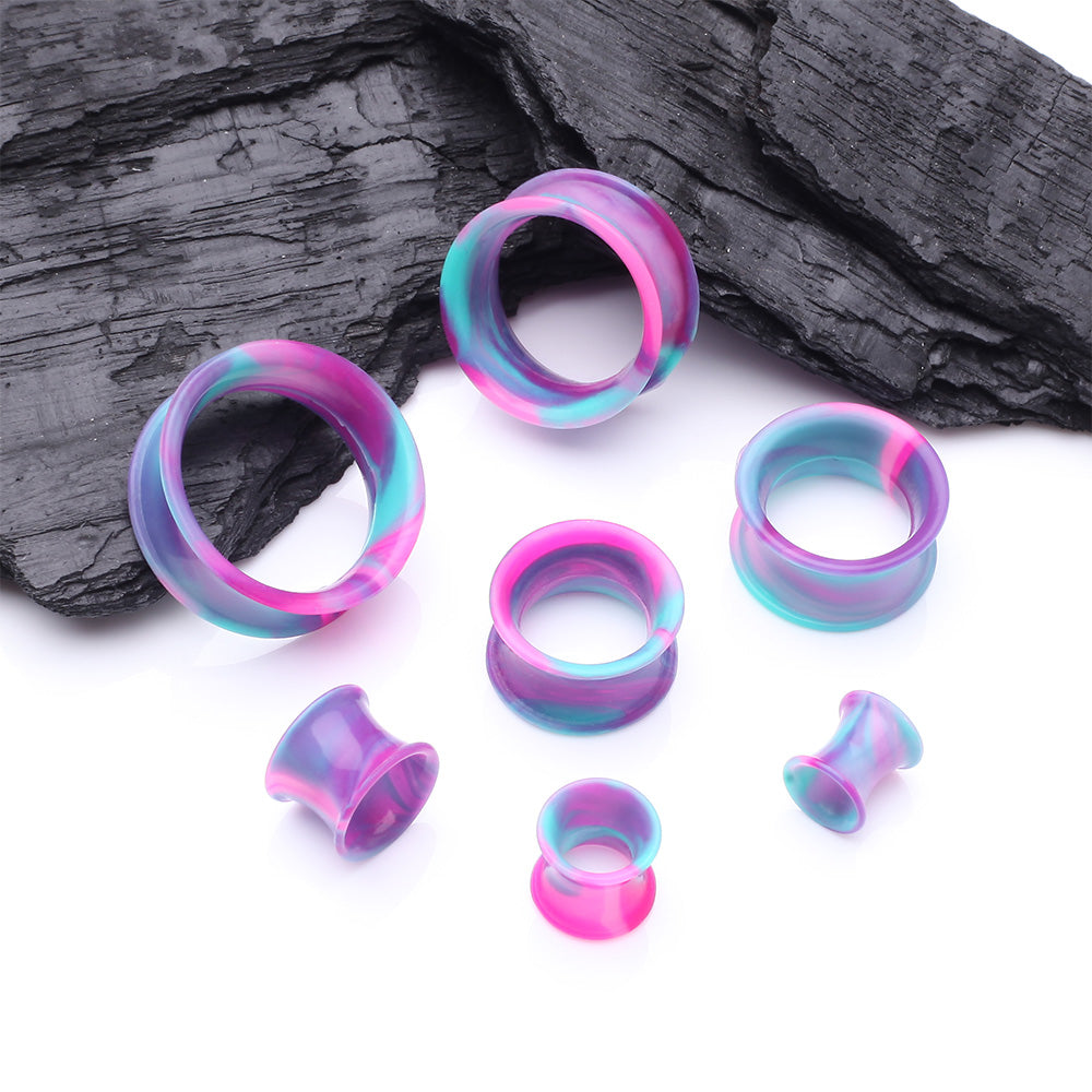 Detail View 2 of A Pair of Ultra Flexible Cosmic Flair Camo Silicone Double Flared Tunnel Plug