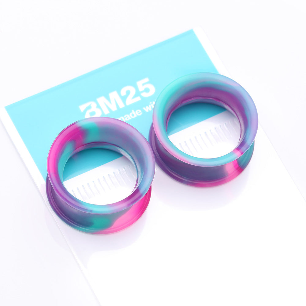 Detail View 4 of A Pair of Ultra Flexible Cosmic Flair Camo Silicone Double Flared Tunnel Plug