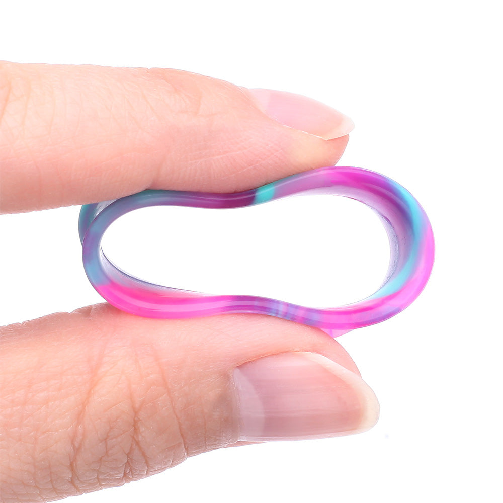 Detail View 3 of A Pair of Ultra Flexible Cosmic Flair Camo Silicone Double Flared Tunnel Plug