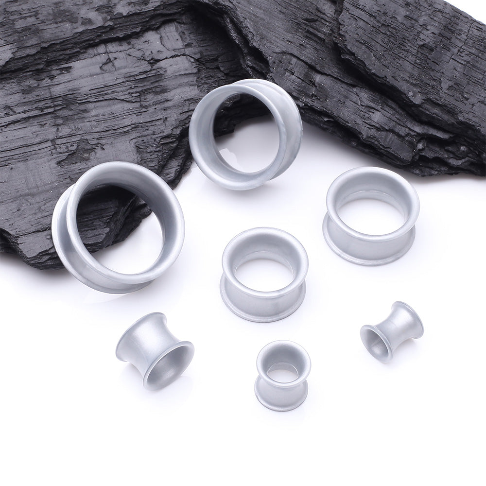 Detail View 2 of A Pair of Ultra Flexible Metallic Silver Silicone Double Flared Tunnel Plug