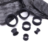 Detail View 2 of A Pair of Ultra Flexible Flat Black Silicone Double Flared Tunnel Plug