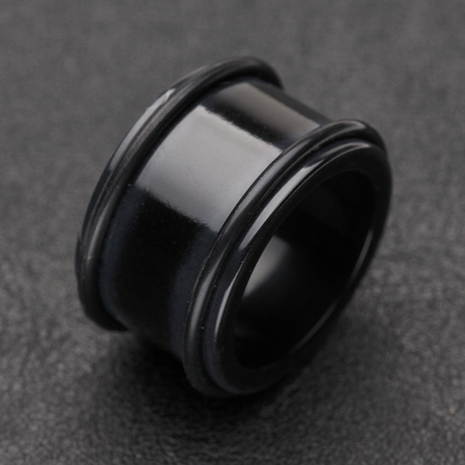 Detail View 1 of A Pair of Basic UV Acrylic No Flare Regs Ear Gauge Tunnel Plug-Black