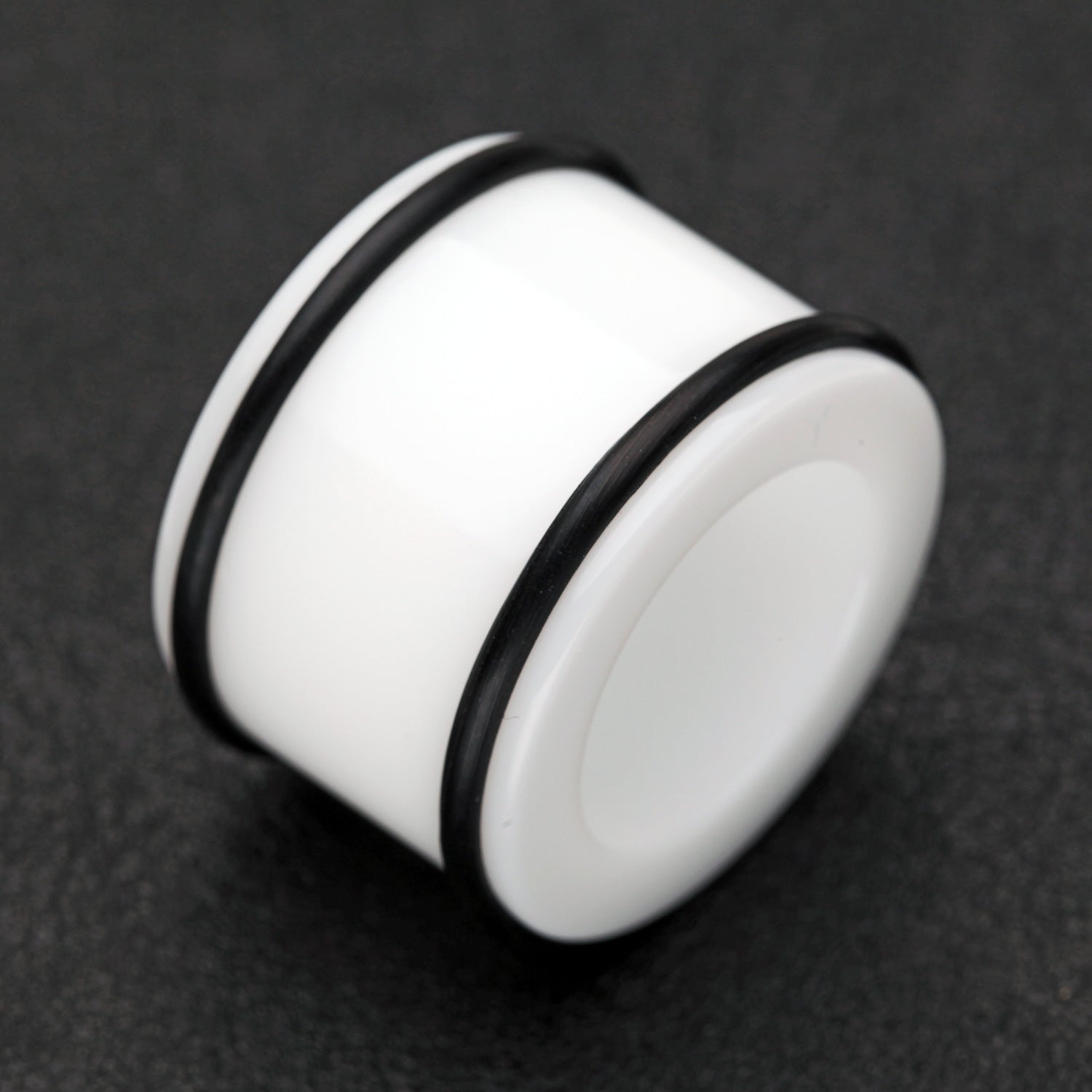 Detail View 1 of A Pair of Basic UV Acrylic No Flare Regs Ear Gauge Tunnel Plug-White