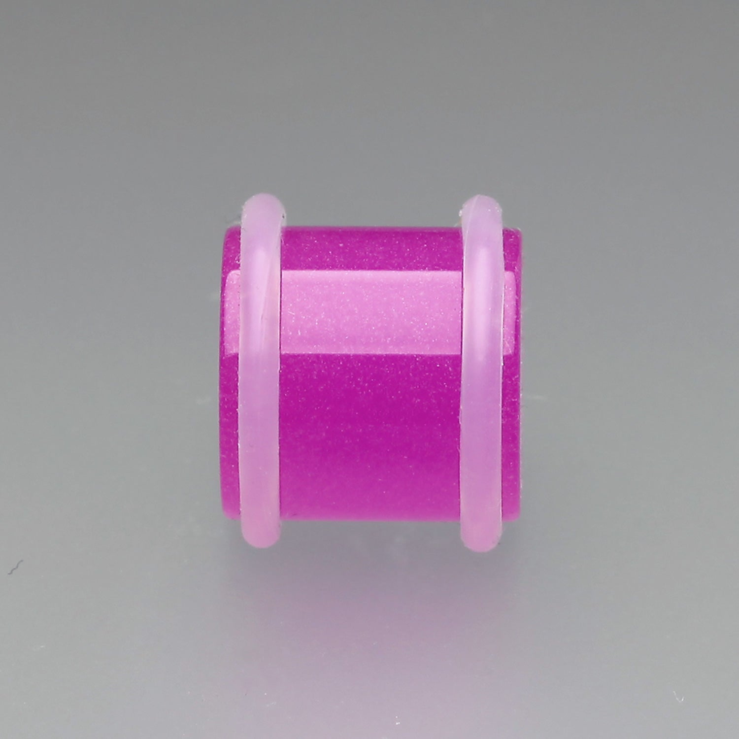 Detail View 1 of A Pair of Glow in the Dark Acrylic Regs Ear Gauge Plug-Purple