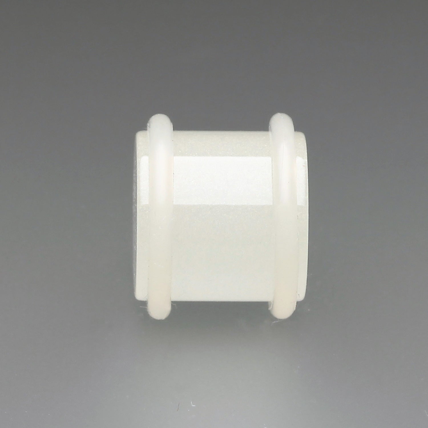 Detail View 1 of A Pair of Glow in the Dark Acrylic Regs Ear Gauge Plug-White