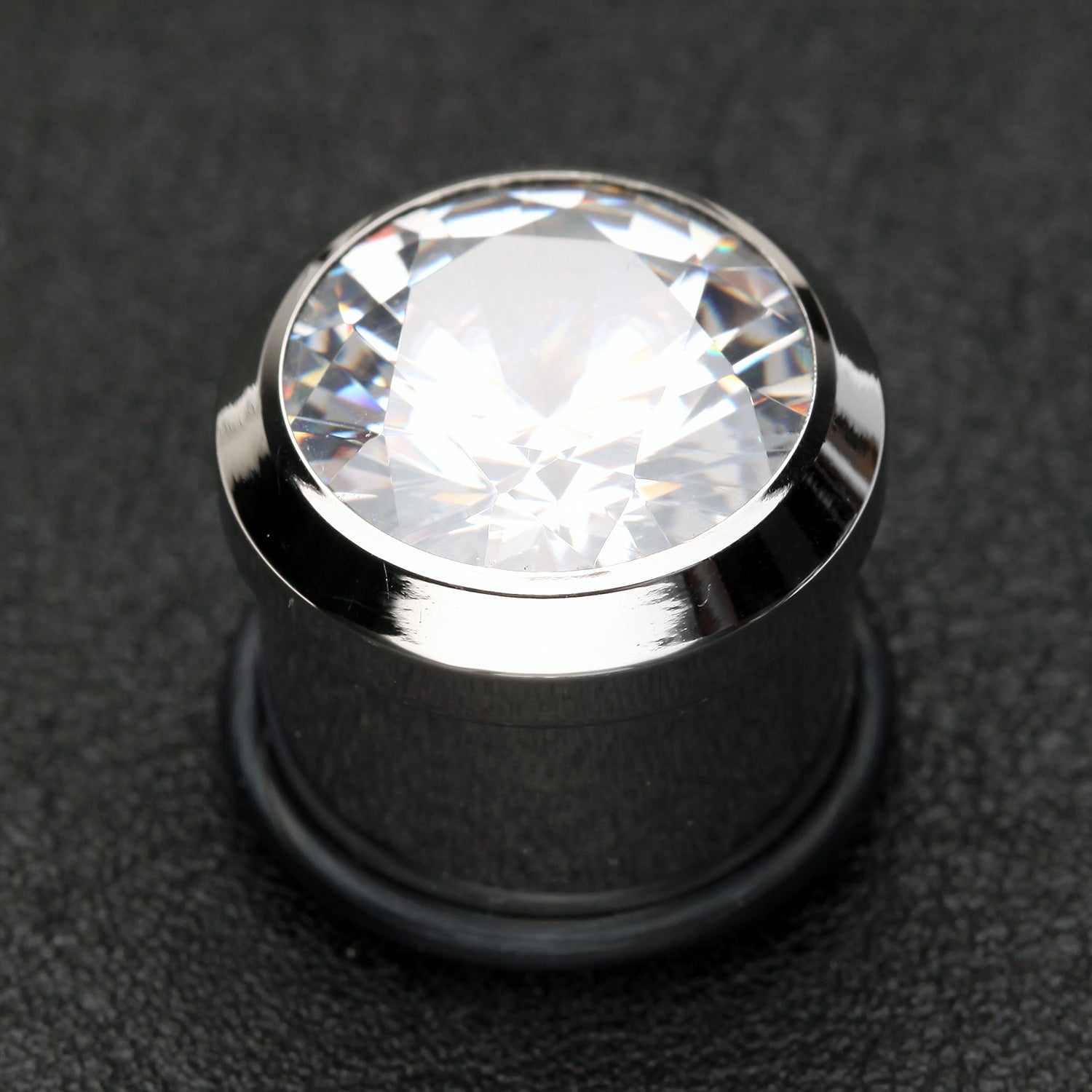 Detail View 1 of A Pair of Magnum CZ Press Fit Single Flared Ear Gauge Plug-Clear Gem