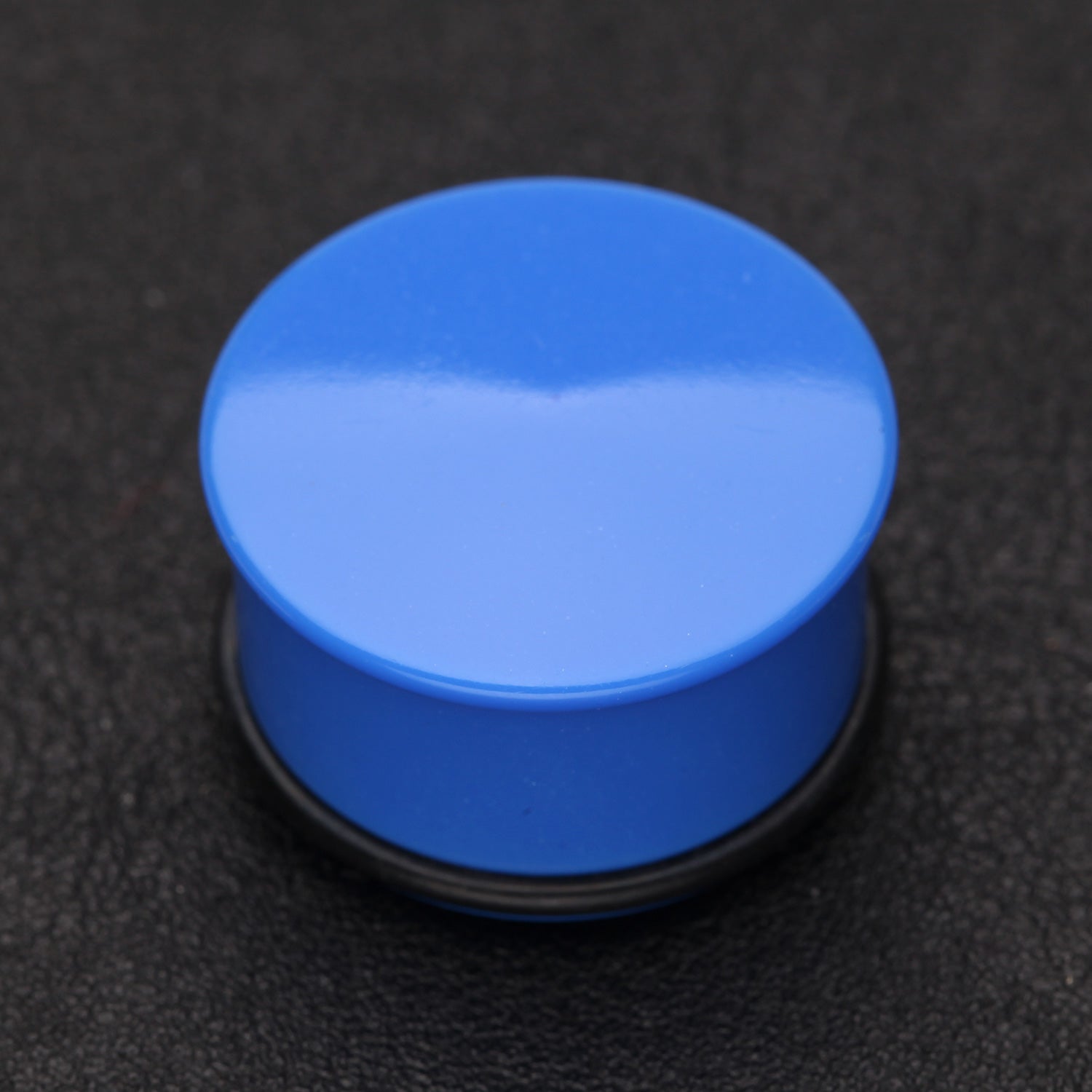 Detail View 1 of A Pair of Neon Colored UV Acrylic Single Flared Ear Gauge Plug-Blue
