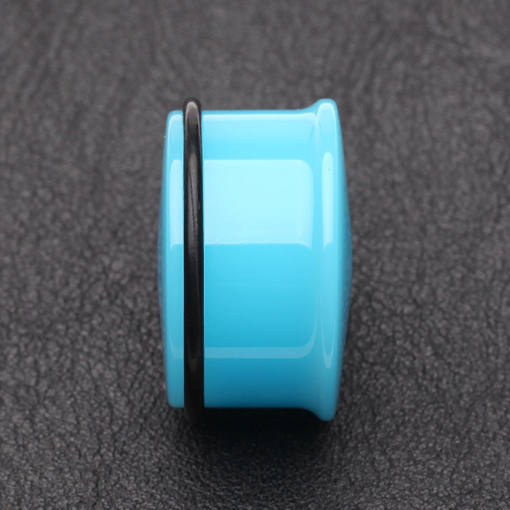 Detail View 2 of A Pair of Neon Colored UV Acrylic Single Flared Ear Gauge Plug-Light Blue