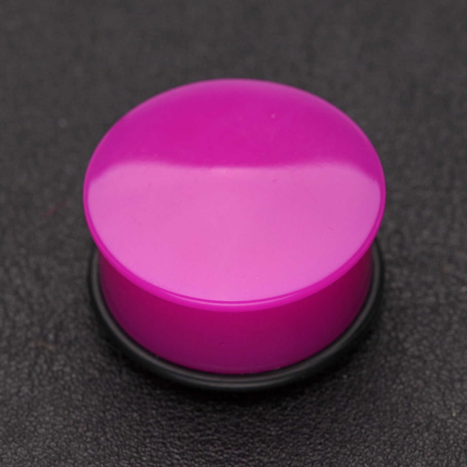 Detail View 1 of A Pair of Neon Colored UV Acrylic Single Flared Ear Gauge Plug-Purple
