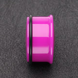 Detail View 2 of A Pair of Neon Colored UV Acrylic Single Flared Ear Gauge Plug-Purple