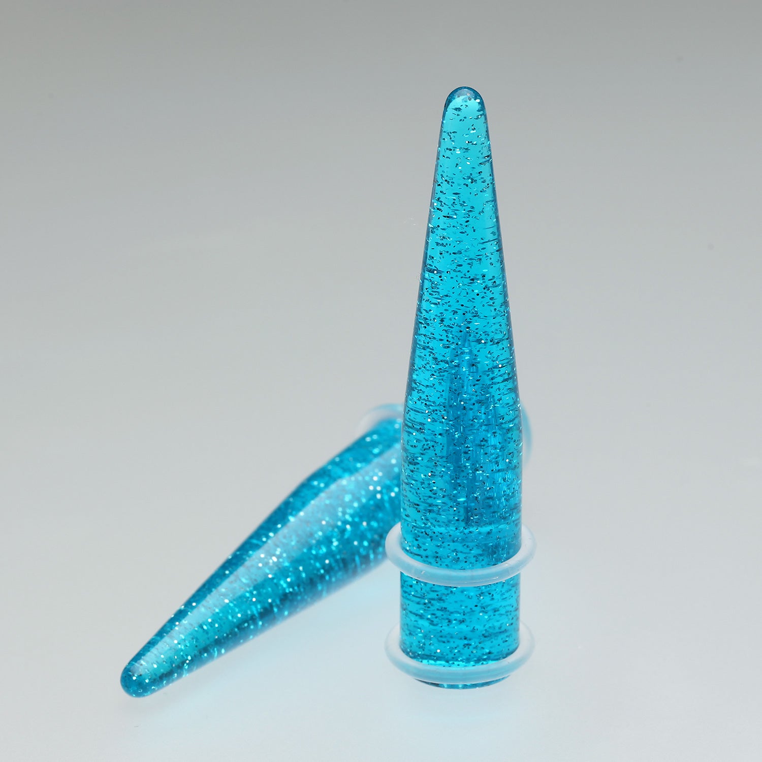 Detail View 1 of A Pair of Glitter UV Acrylic Taper-Blue