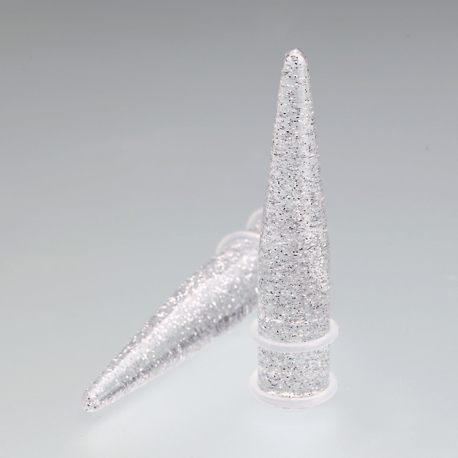 Detail View 1 of A Pair of Glitter UV Acrylic Taper-Clear Gem