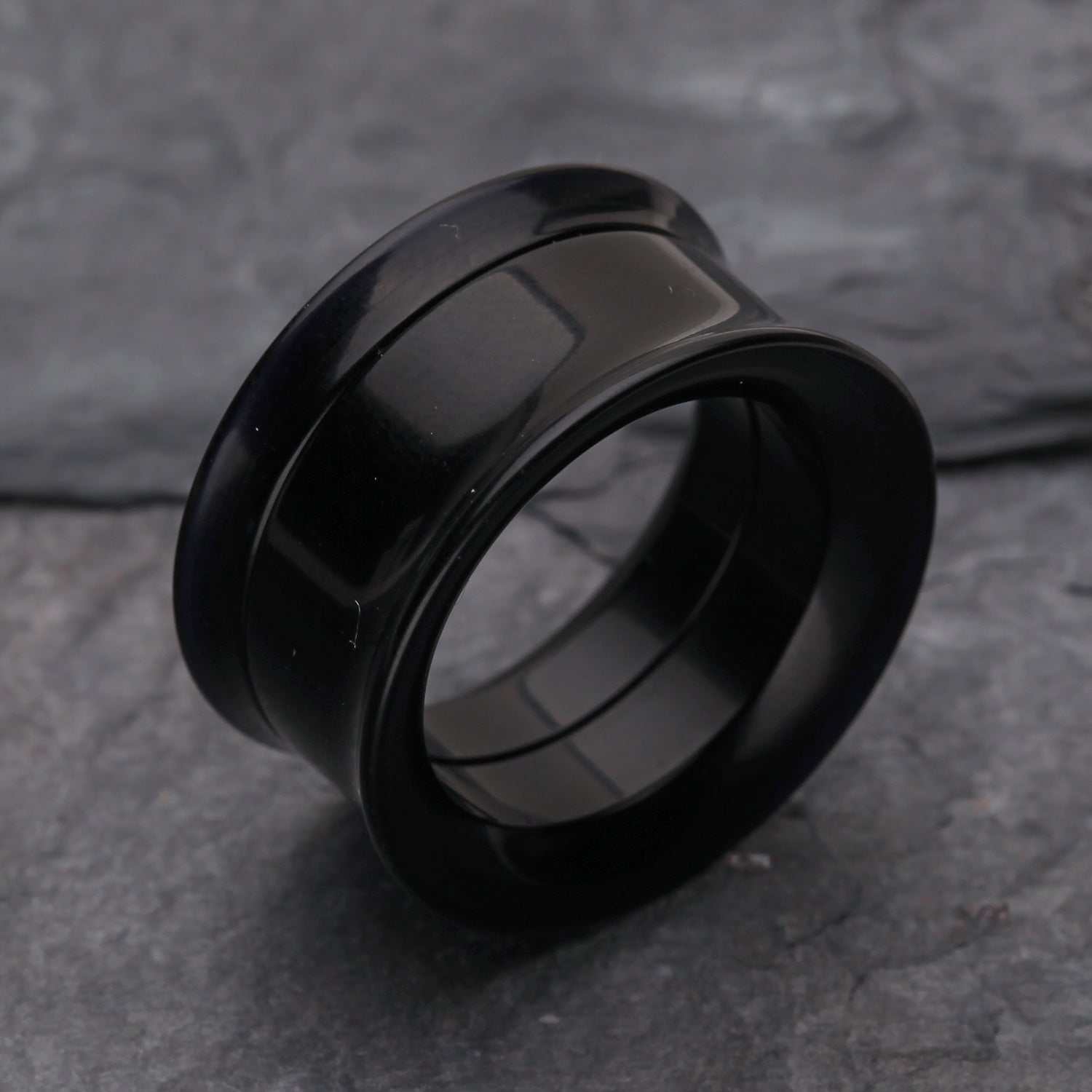 Detail View 1 of A Pair of Solid UV Smooth Flared Screw-Fit Ear Gauge Tunnel Plug-Black